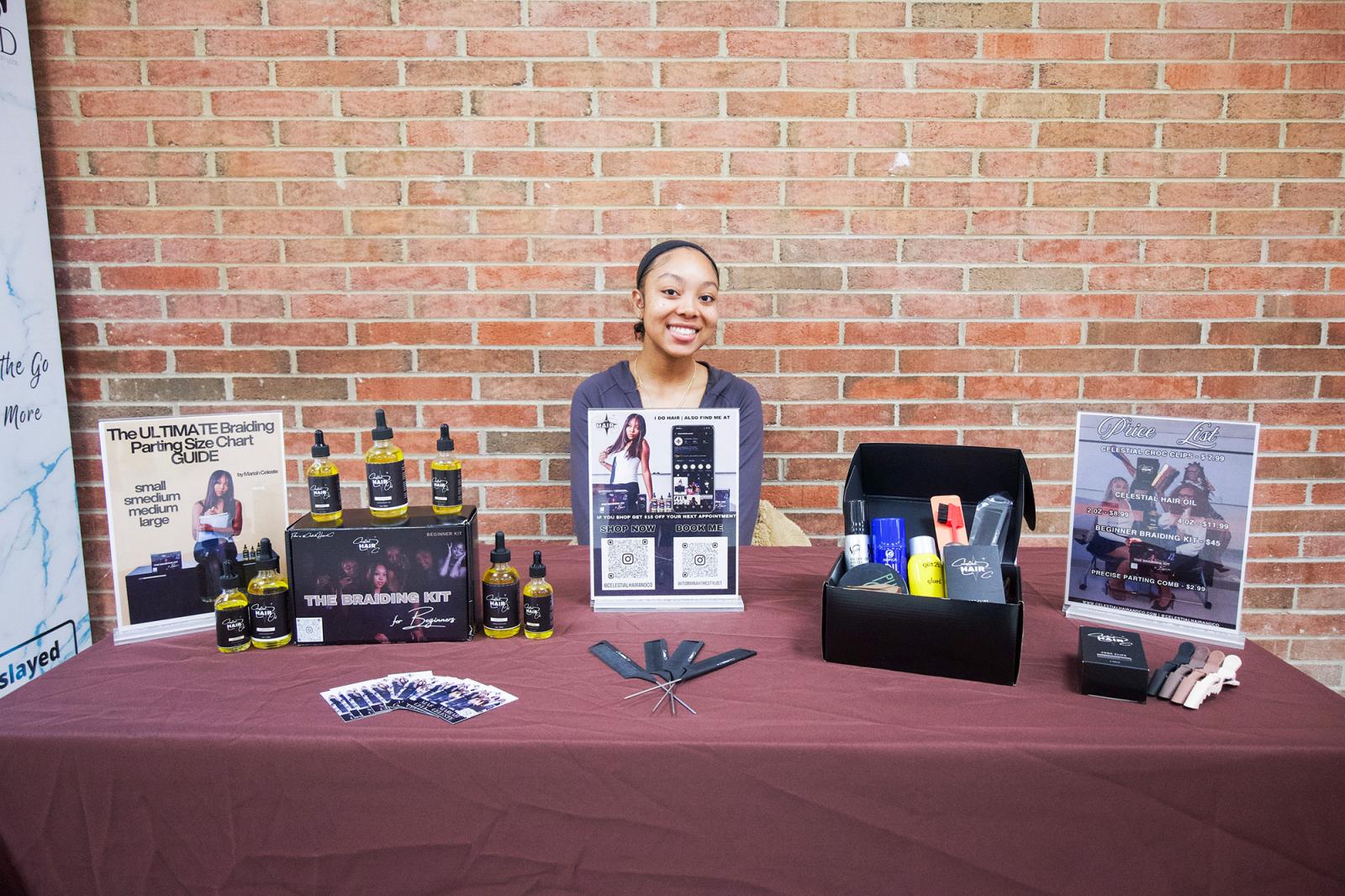 Mariah Washington with products at table