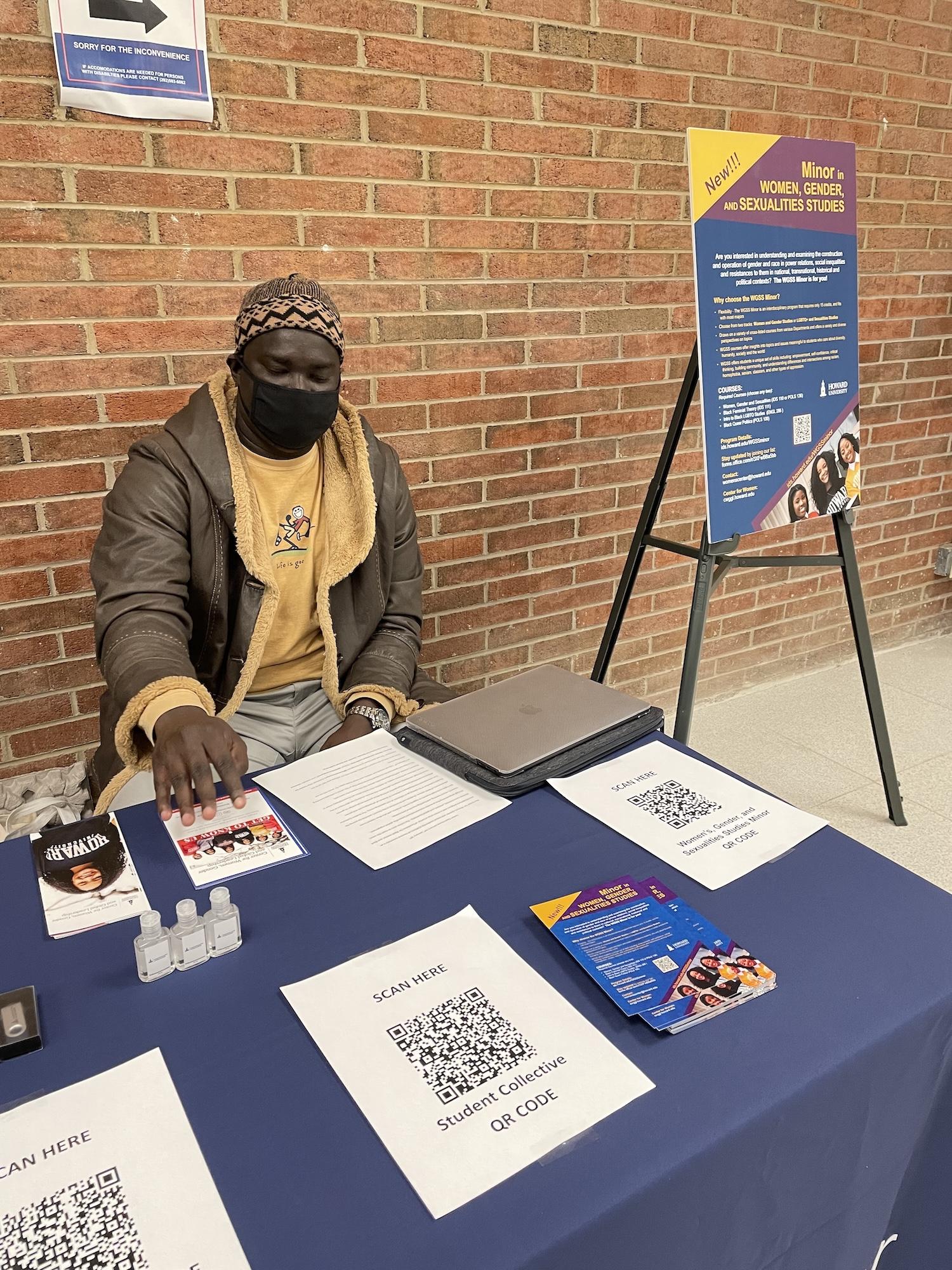 Moustapha Hoyeck tabling in support of the new Women's Studies minor in 2021