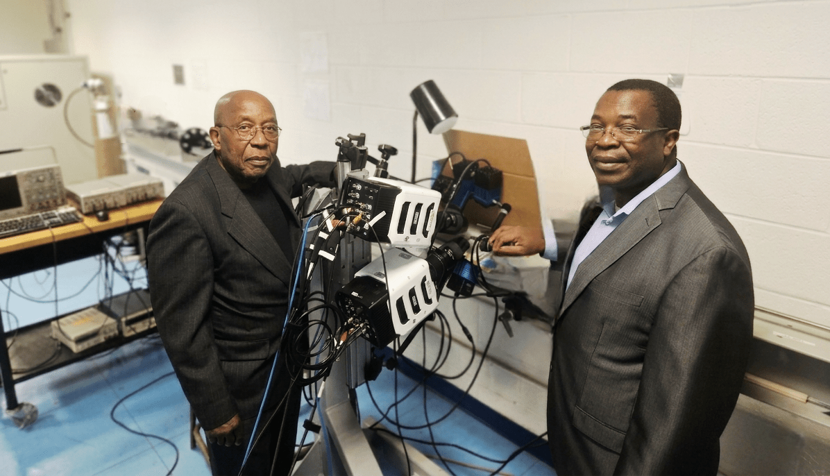 Owolabi and Glakpe demonstrate the equipment they will be using for the project.