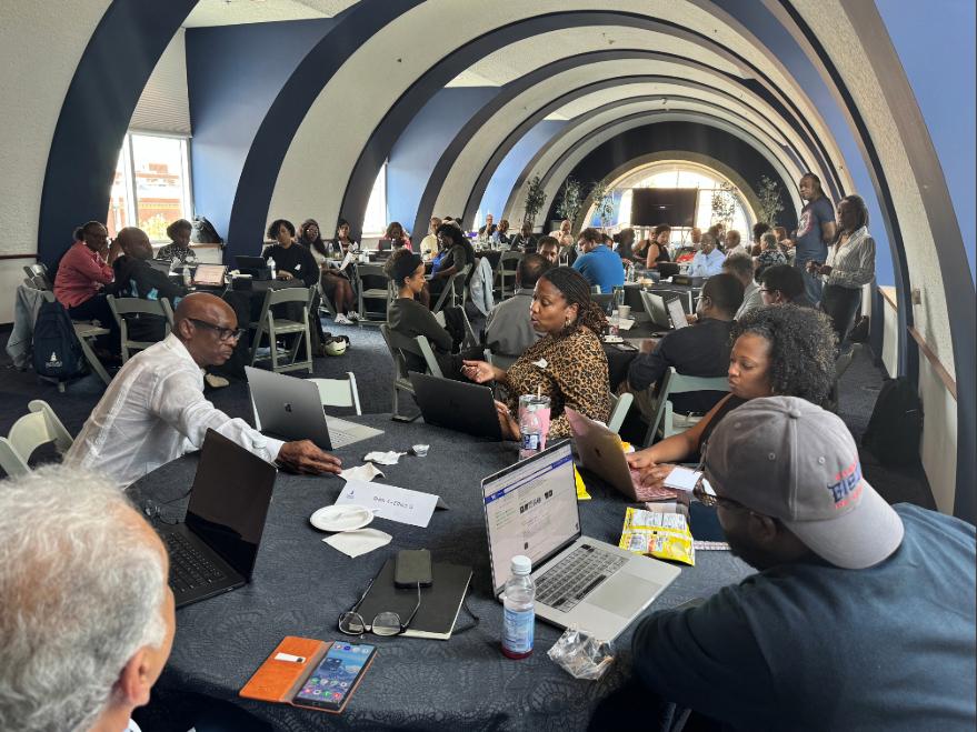 Faculty and staff gathered at Louis Stokes Health Sciences Library for AI workshop session