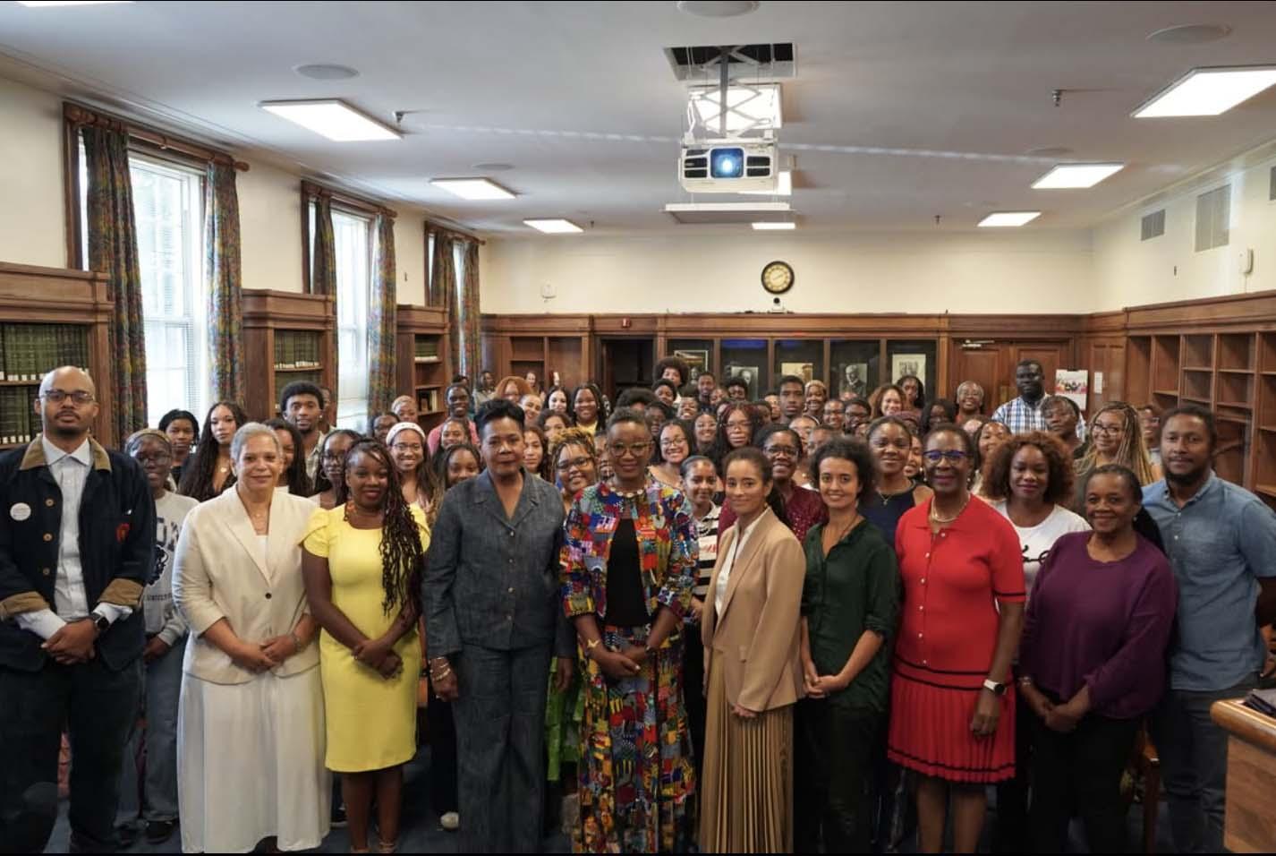 A large group of people inside of Howard University's Browsing Room in Founders Library