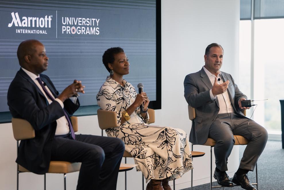 Dr. Wayne A. I. Frederick, Marisa Milton and Anthony Capuano sitting side by side on a panel at Marriott International in Bethesda