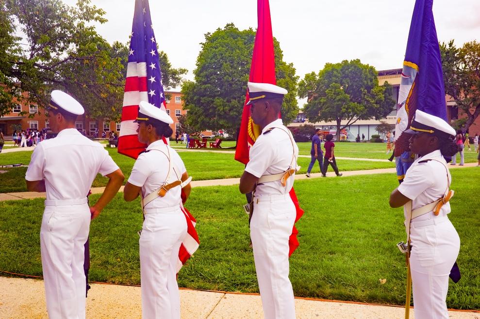 Howard University Color Guard on The Yard wearing white military uniforms presenting the colors