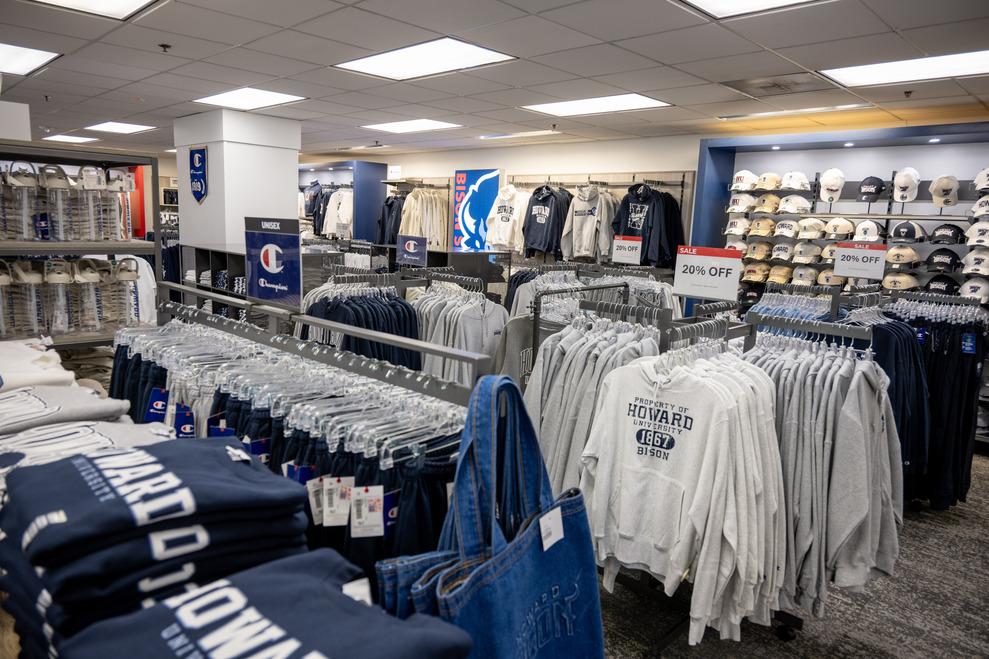 Bison Exchange Campus Store merchandise includes an array of Howard University sweatshirts on clothing racks
