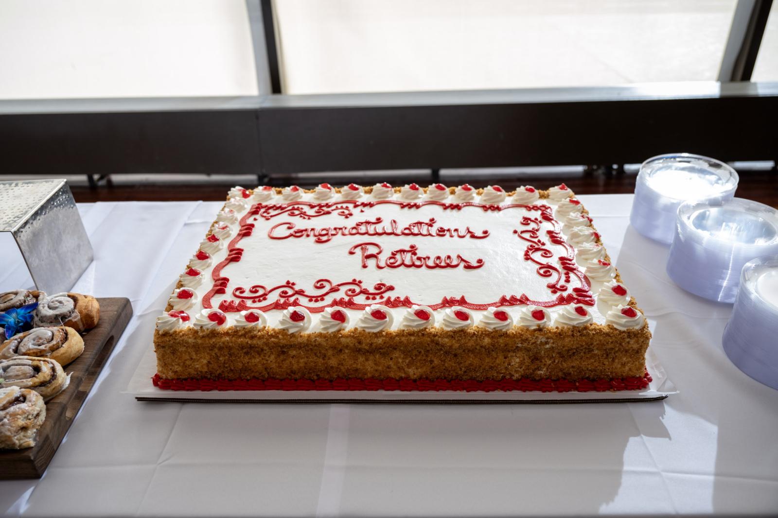 Vanilla and red sheet cake for Retirement Celebration at Blackburn Center Ballroom
