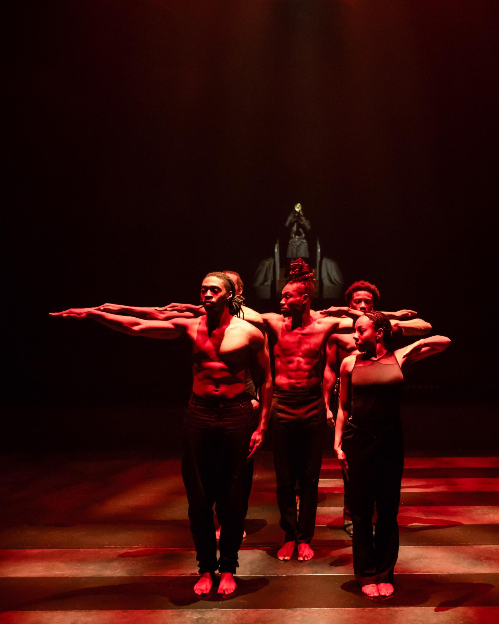 Dancers from Step Afrika!'s "The Fruits of Our Labor" in formation on stage at Arena Stage